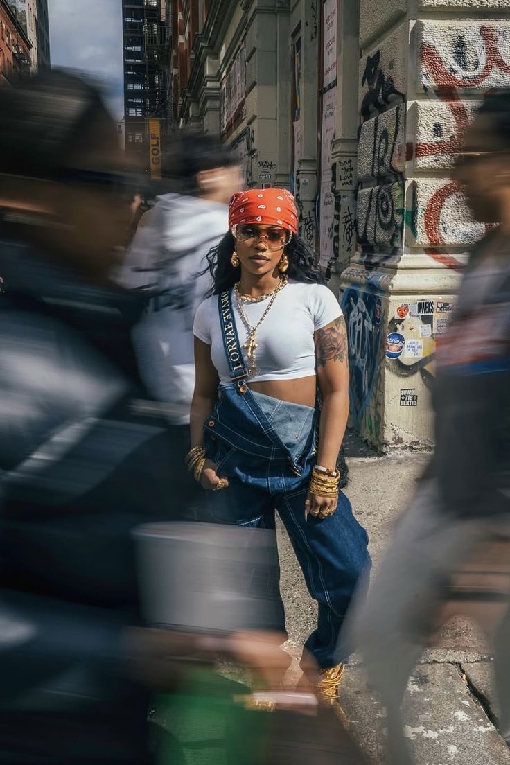 Y2K clothing — baggy jeans, denim mini skirts and graphic tees